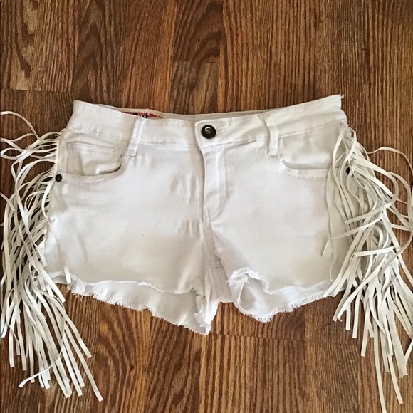 white denim fringe shorts